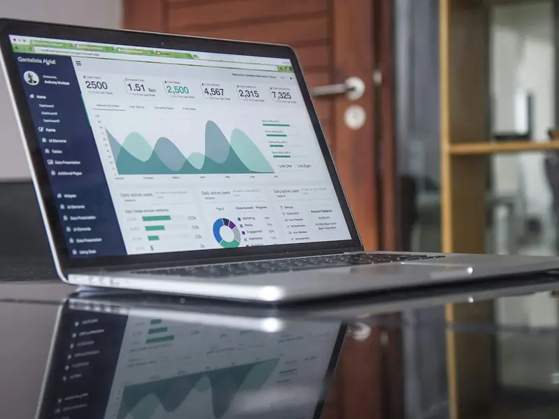 Laptop showing website analytics charts