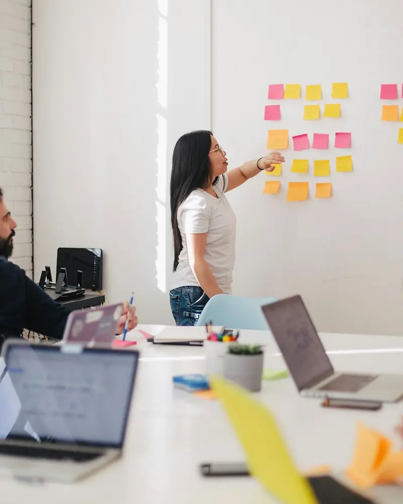 Team planning a campaign at a whiteboard